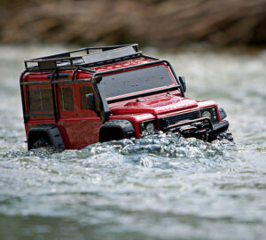 v02_C371904B9DC64D826616F91CD1C792F6.jpg LAND ROVER DEFENDER SCALE & TRAIL 4WD RØD- TRAXXAS (TRX82256-4-RED)