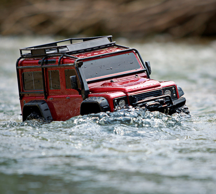 LAND ROVER DEFENDER SCALE & TRAIL 4WD RØD- TRAXXAS (TRX82256-4-RED)